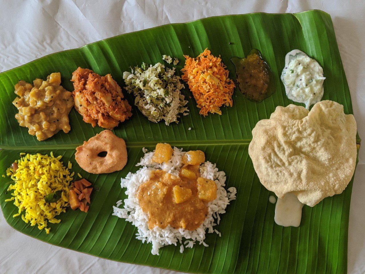 Traditional South Indian wedding meal served on a banana leaf